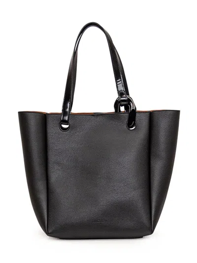 Jw Anderson Corner Logo Debossed Tote Bag In Black