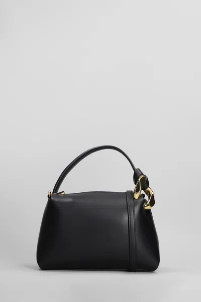 Jw Anderson Logo Debossed Top Handle Bag In Black