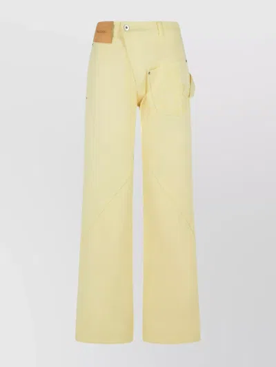 Jw Anderson Cotton Trousers With Wide Twisted Leg In Yellow