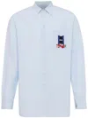 Jw Anderson Light Blue Shirt With Classic Collar And Embroidery Detail On Front And Cuff In Blue