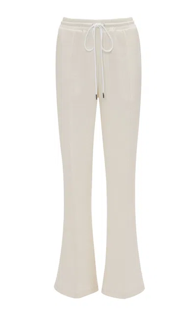 Jw Anderson Flared Crepe Pants In Neutral