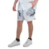 Jw Anderson Graphic-print Striped Swim Shorts In White