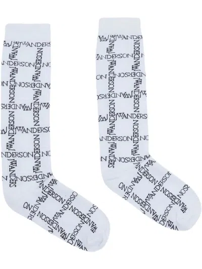 Jw Anderson Intarsia-logo Long Ankle Socks In Gray