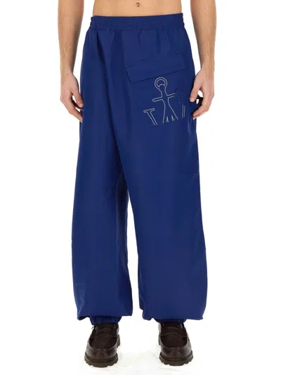 Jw Anderson Twisted Anchor-embroidered Track Trousers In Airforce Blue