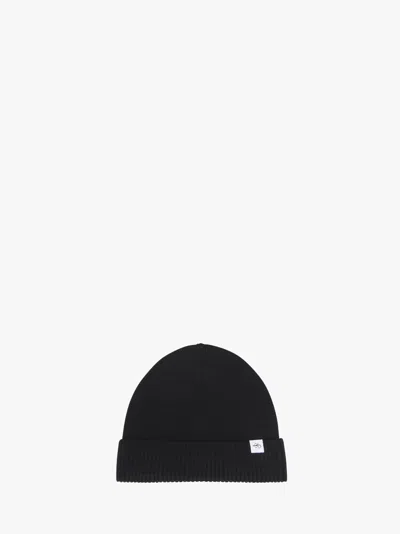 Jw Anderson Knitted Beanie Hat In Black