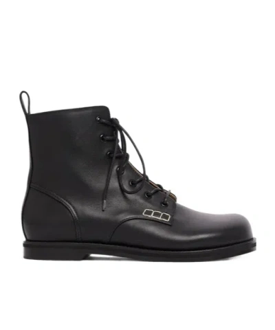 JW ANDERSON LACE-UP BOOTS