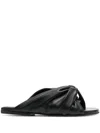 Jw Anderson Leather Twist Slides With Chain Detail In Schwarz