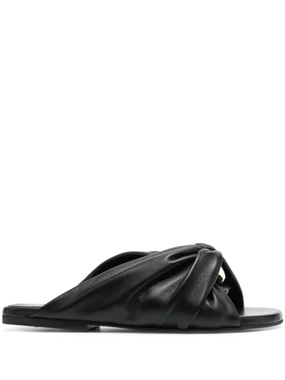 Jw Anderson Gold-tone Hardware Leather Sandals In Schwarz