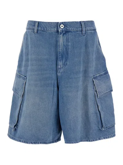JW ANDERSON LIGHT BLUE BERMUDA SHORTS WITH CARGO POCKETS AND LOGO PATCH ON THE BACK IN DENIM MAN