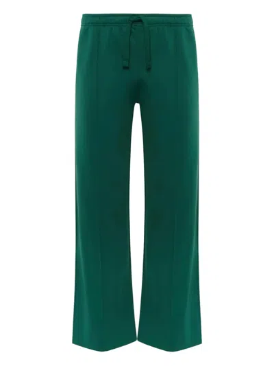 Jw Anderson Logo-appliqué Drawstring Trousers In Green