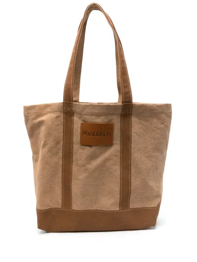 Jw Anderson Logo-appliqué Tote Bag In Brown