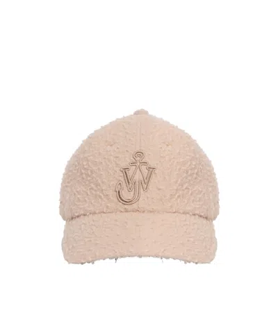 Jw Anderson Logo Embroidered Baseball Cap In Brown