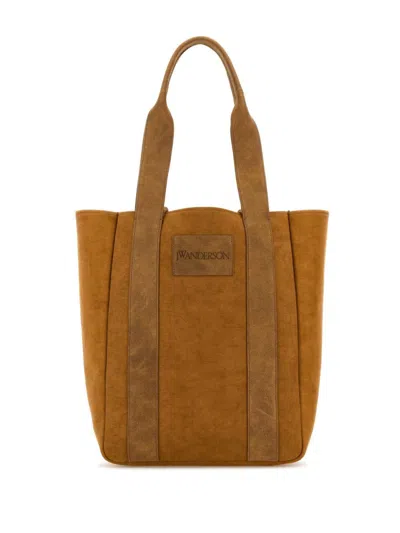 Jw Anderson Logo-patch Two-tone Canvas Tote Bag In Braun