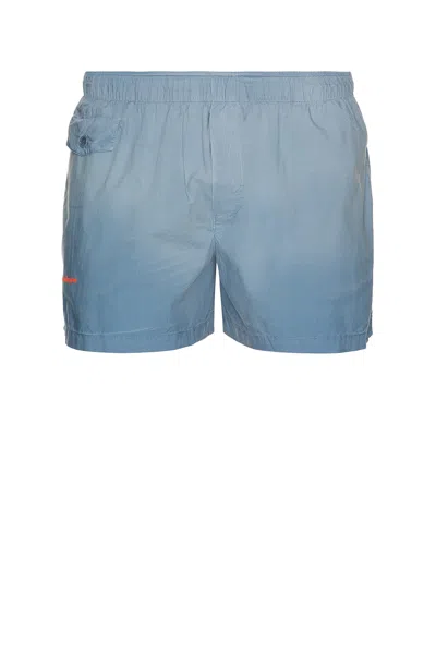 JW ANDERSON LOGO PRINT SHORTS