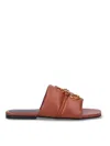 Jw Anderson Embellished Open Toe Flat Sole Mules In Brown