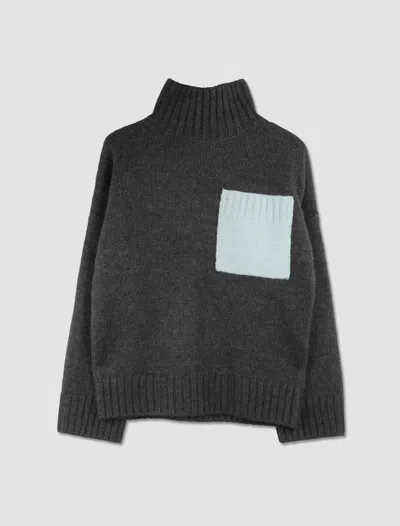 Jw Anderson Maglione A Collo Alto Con Tasca Patch In Black