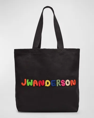 Jw Anderson Men's Embroidered Canvas Tote Bag In Black