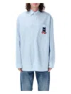 Jw Anderson Light Blue Shirt With Classic Collar And Embroidery Detail On Front And Cuff In Light Blue
