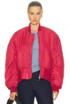 Jw Anderson Oversized Curved Hem Bomber Jacket Ruby In Red