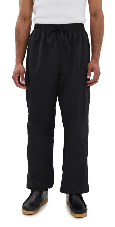 Jw Anderson Black Pants With Elastic Waist With Drawstring In Techn Fabric Man