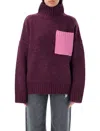 Jw Anderson Colorblock Patch Pocket Oversized Wool Turtleneck Sweater In Plum