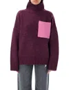 Jw Anderson Contrast-pocket Ribbed-knit Jumper In Plum