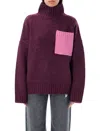 Jw Anderson Colorblock Patch Pocket Oversized Wool Turtleneck Sweater In Plum