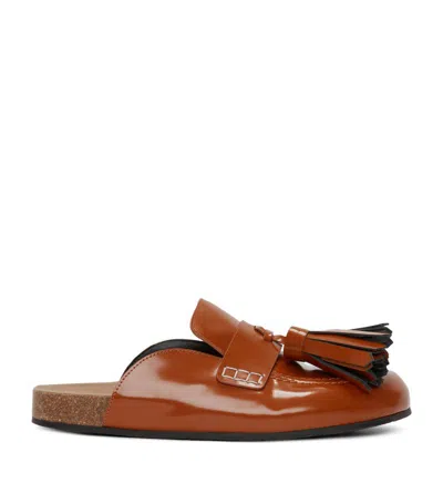 Jw Anderson Patent Leather Tassel Mules In Brown