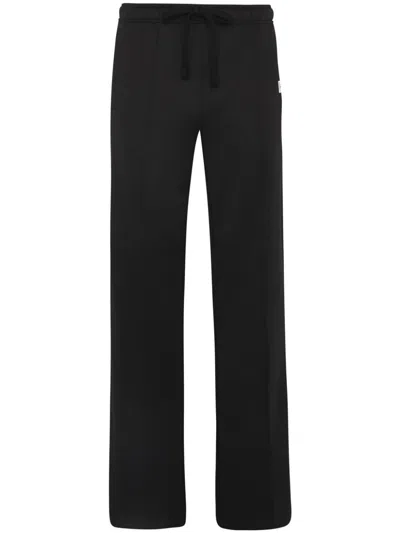 Jw Anderson Pintuck Track Pants In Black
