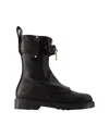 Jw Anderson Lock Combat Ankle Boots In Black