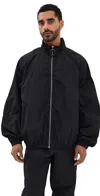 Jw Anderson Black Jacket With Mock Neck And Raglan Sleeves In Tech Fabric Man In Black