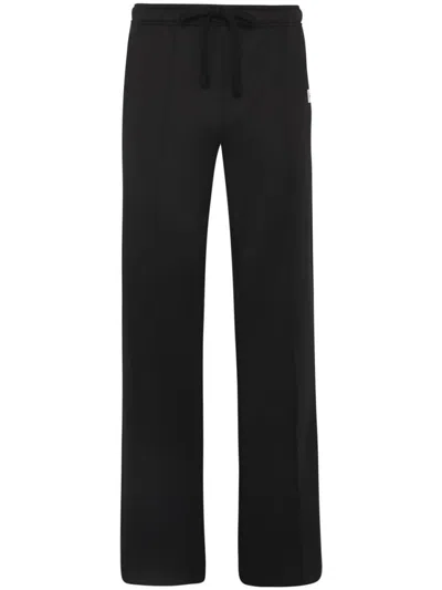 JW ANDERSON RELAXED WIDE-LEG TROUSERS WITH ELASTIC WAISTBAND