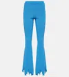 Jw Anderson Ribbed-knit Distressed Slim Pants In Blue