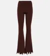 Jw Anderson Ribbed-knit Distressed Slim Pants In Brown