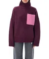 Jw Anderson Colorblock Patch Pocket Oversized Wool Turtleneck Sweater In Red