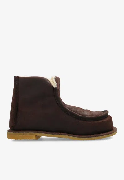 JW ANDERSON SHEARLING-LINED SUEDE BOOTS