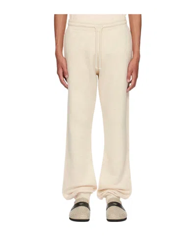 JW ANDERSON SLOGAN-EMBROIDERED COTTON TRACK PANTS