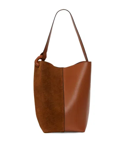 Jw Anderson Jwa Corner Bucket - Suede Crossbody Bag In Brown