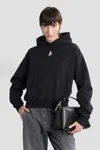 Jw Anderson Cropped Black Hoodie With Subtle Branding And Relaxed Fit In Black