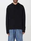 Jw Anderson Logo Embroidered Hoodie In Black
