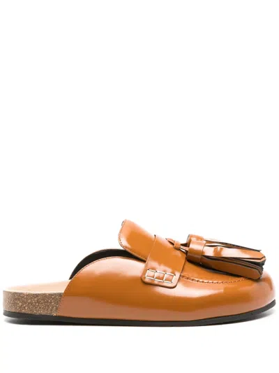 Jw Anderson Tassel Leather Mules In Brown