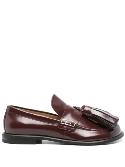 Jw Anderson Tasseled Leather Loafers In Brown