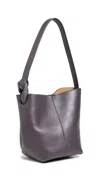 Jw Anderson The Jwa Corner Small Bucket Bag Deep Mauve In Deep Mauve