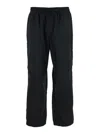 Jw Anderson Black Pants With Elastic Waist With Drawstring In Techn Fabric Man In Black