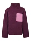 Jw Anderson Colorblock Patch Pocket Oversized Wool Turtleneck Sweater In Rosado