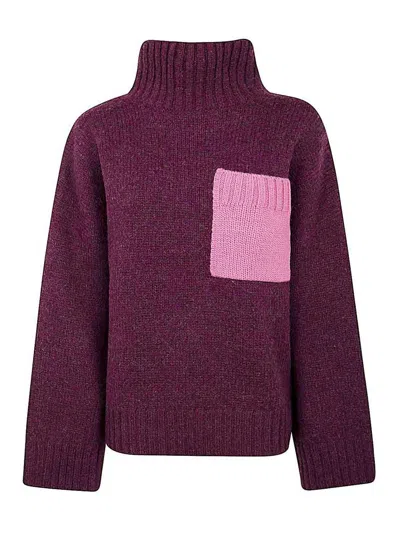 JW ANDERSON SUÉTER CON CUELLO ALTO - ROSADO