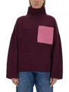Jw Anderson Contrast-pocket Ribbed-knit Jumper In Bordeaux
