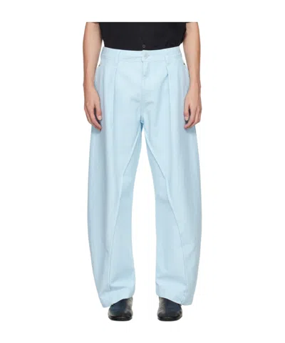 JW ANDERSON TWIST STITCHING TROUSERS