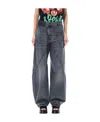Jw Anderson Asymmetrical Washed Denim Trousers In Gray