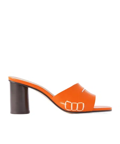 Jw Anderson Whipstitched Leather Mules In Orange